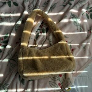 fluffy tan shoulder bag